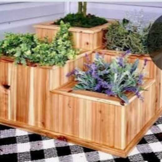 Wood planter box with fresh plantings